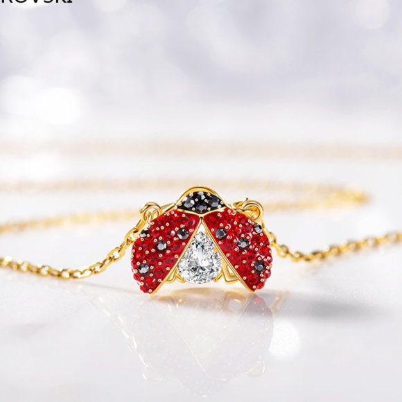 Swarovski's beating heart ladybug necklace pendant is exquisite and sparkles in - Picture 3 of 5